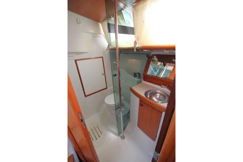 Slide: The Image of Interior of 2004 Jeanneau Sun Odyssey 35 yacht bathroom with sink and toilet. - 26
