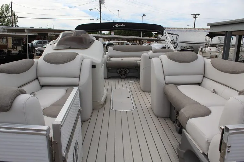Slide: The Image of 2020 Avalon Catalina Versatile Rear Bench 23' pontoon boat interior with plush seating. - 15