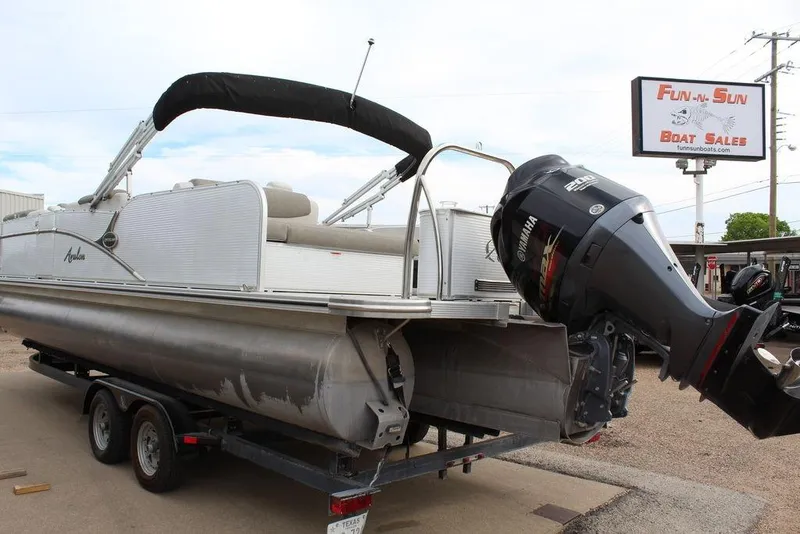 Slide: The Image of 2020 Avalon Catalina Versatile Rear Bench 23' pontoon boat with Yamaha motor at dealership. - 16