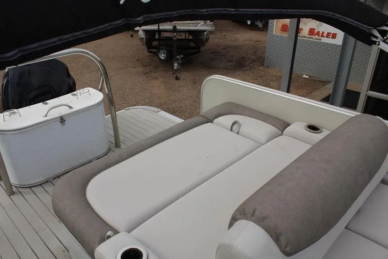 Slide: The Image of 2020 Avalon Catalina Versatile Rear Bench 23' boat interior with seating and storage. - 24