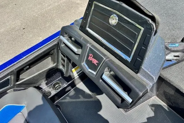Slide: The Image of 2023 Ranger Z520R Cup-Equipped boat dashboard with storage compartment and seating. - 12