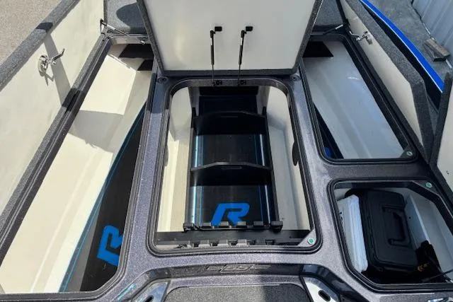 Slide: The Image of 2023 Ranger Z520R Cup-Equipped boat storage compartments with open lids. - 8