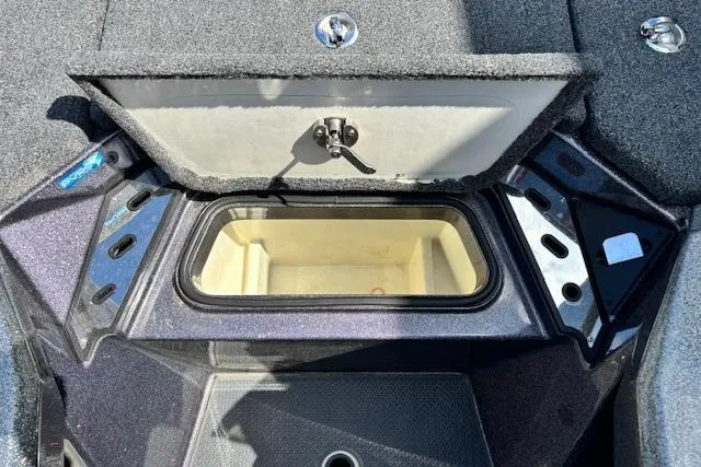 Slide: The Image of 2023 Ranger Z520R Cup-Equipped boat storage compartment, open lid, interior view. - 9