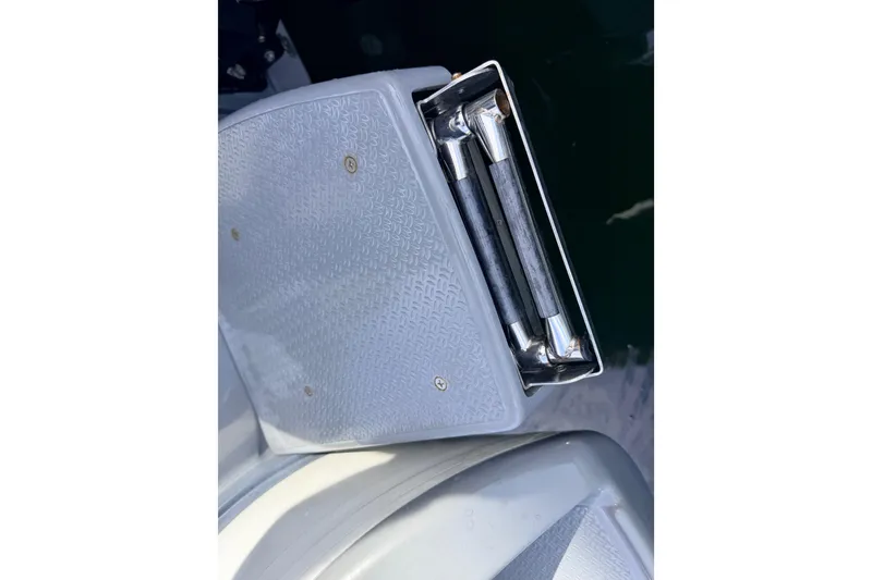 Slide: The Image of Foldable ladder on a 2020 Grand Inflatables G580 boat, featuring textured steps. - 17