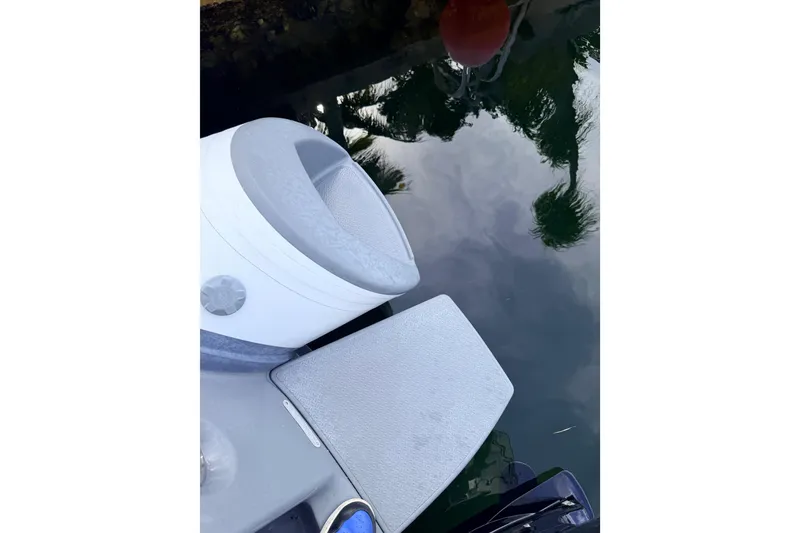 Slide: The Image of 2020 Grand Inflatables G580 boat detail with water reflection and docked buoy. - 19