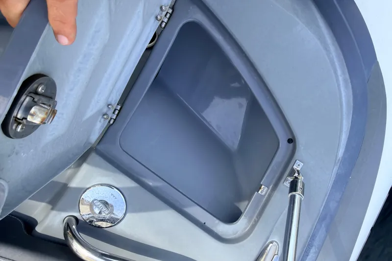 Slide: The Image of Open storage compartment on a 2020 Grand Inflatables G580 boat. - 22