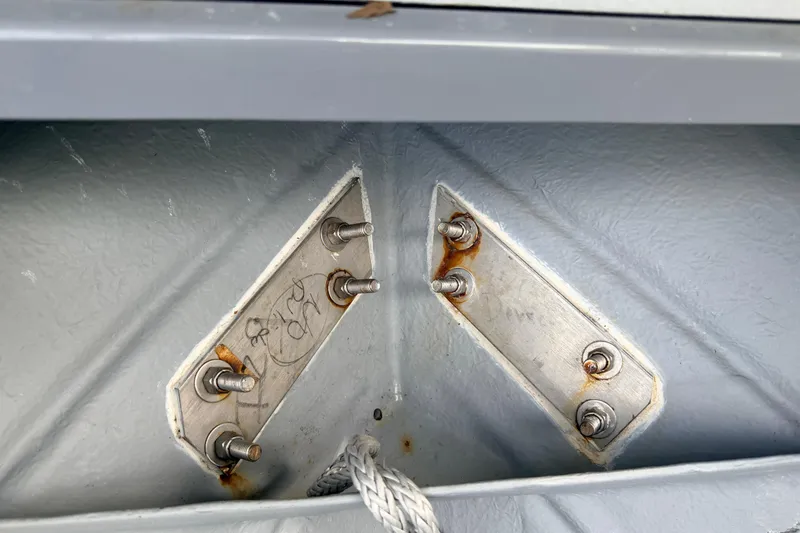 Slide: The Image of Close-up of rusted bolts on a 2020 Grand Inflatables G580 boat. - 30