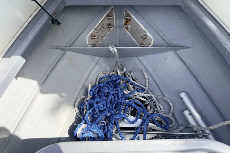 Slide: The Image of Storage compartment of 2020 Grand Inflatables G580 boat with ropes and anchor. - 34