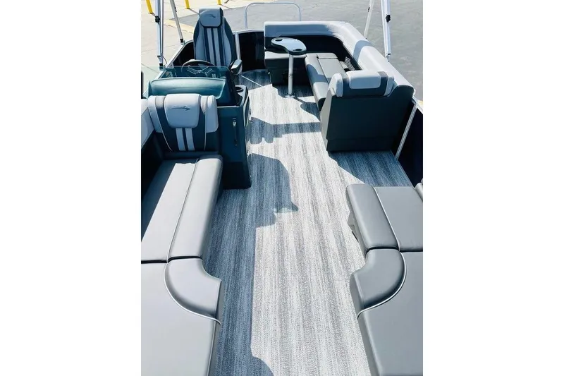 Slide: The Image of Luxurious interior of 2026 Bennington S L-Bench 20 SL TRITOON with plush seating and modern design. - 5