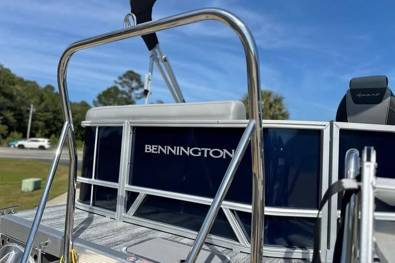Slide: The Image of 2026 Bennington S L-Bench 20 SL Tritoon, sleek design, blue panels, sunny day. - 8
