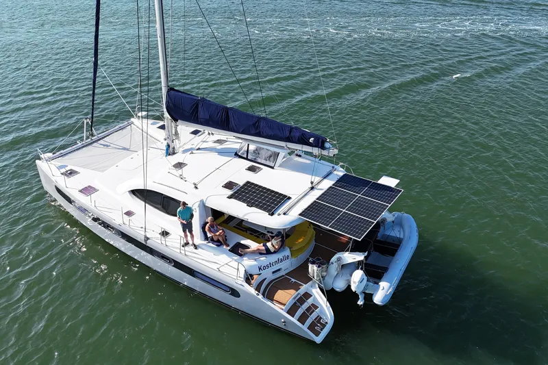 The Image of 2007 Leopard 46 catamaran with solar panels, sailing on calm waters. - 0