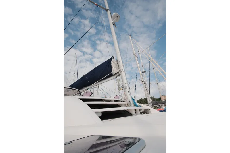 Slide: The Image of Sailboat mast and rigging on a 2007 Leopard 46 under a blue sky. - 10