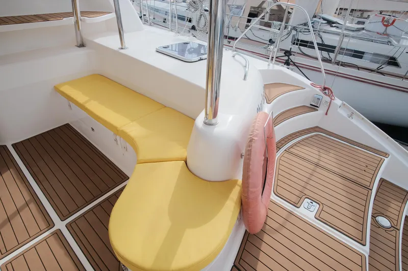 Slide: The Image of Luxury Leopard 46 yacht deck with yellow seating and teak flooring, 2007 model. - 14