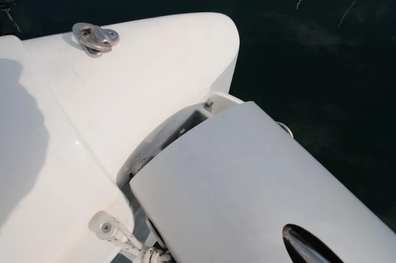 Slide: The Image of Close-up of a 2007 Leopard 46 yacht's bow with anchor detail. - 19