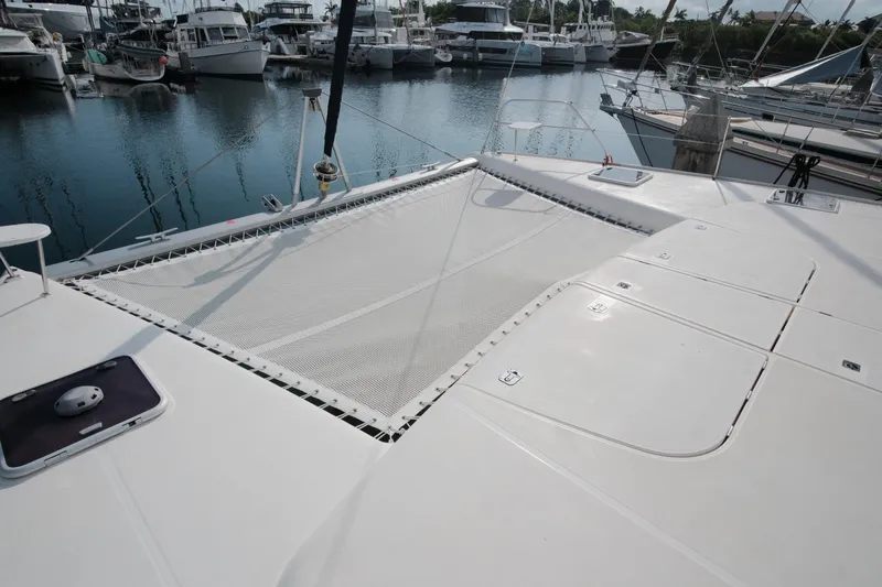 Slide: The Image of Leopard 46 catamaran deck with netting, docked in a marina, 2007 model. - 23