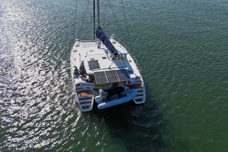 Slide: The Image of Aerial view of 2007 Leopard 46 catamaran sailing on calm waters. - 3