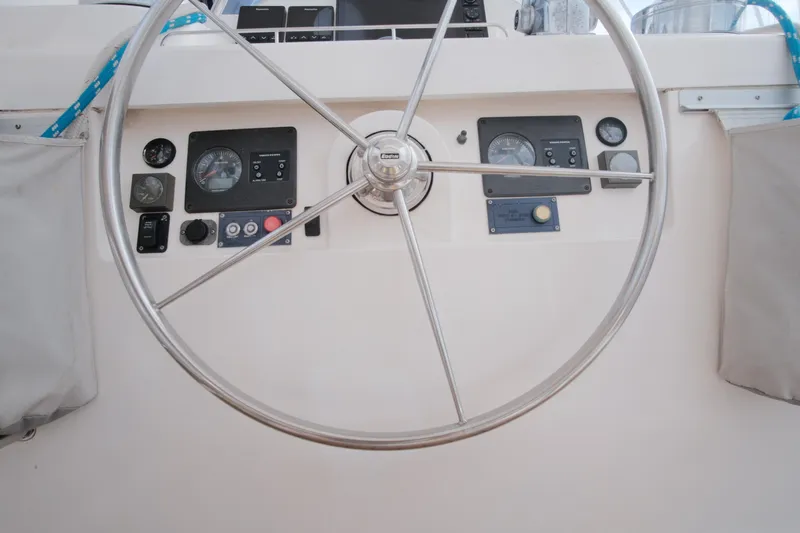 Slide: The Image of Steering wheel and dashboard of a 2007 Leopard 46 yacht. - 35