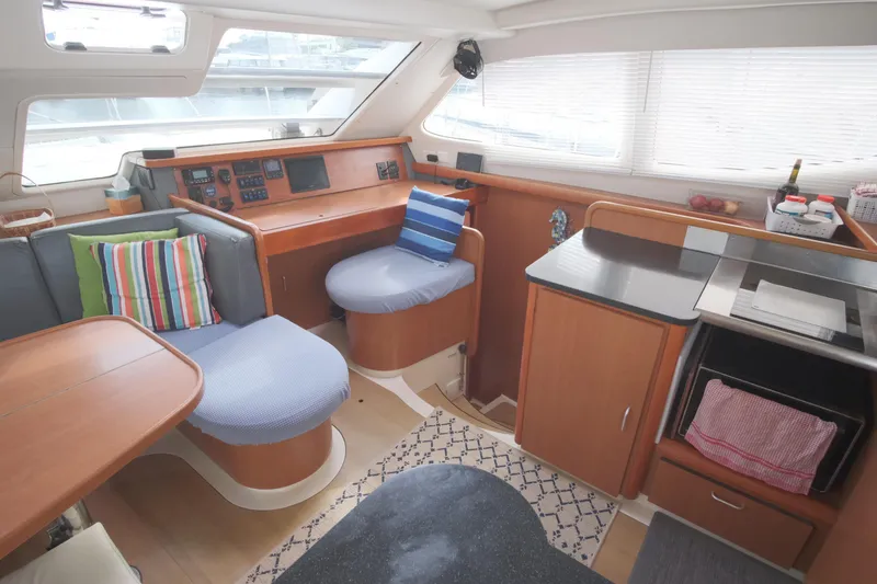 Slide: The Image of Interior of 2007 Leopard 46 yacht with cozy seating and modern kitchen amenities. - 45