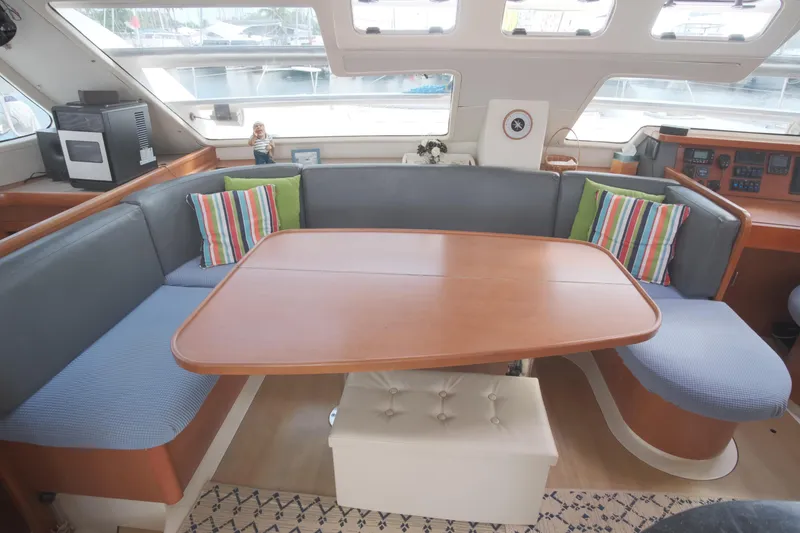 Slide: The Image of Interior of 2007 Leopard 46 yacht with cozy seating and colorful cushions. - 46