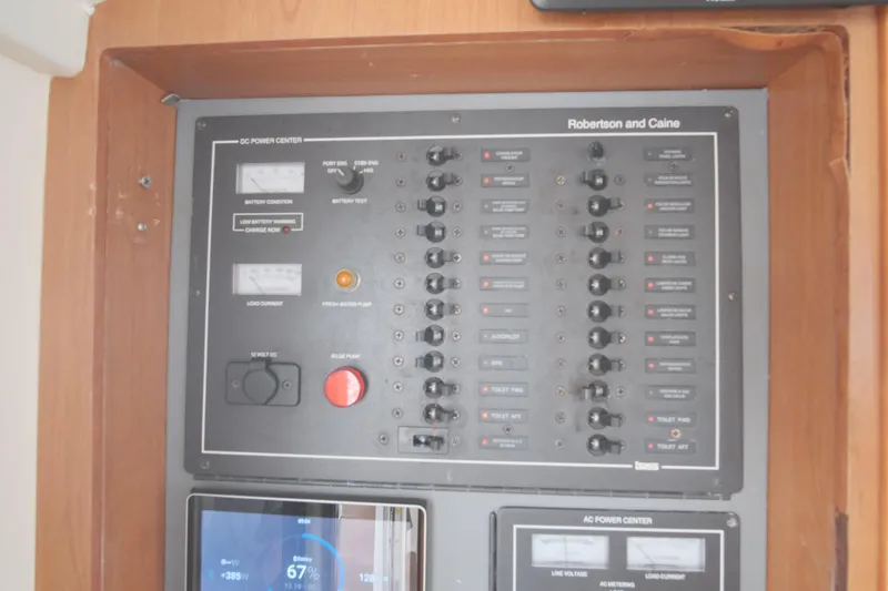 Slide: The Image of Electrical control panel on a 2007 Leopard 46 yacht by Robertson and Caine. - 50