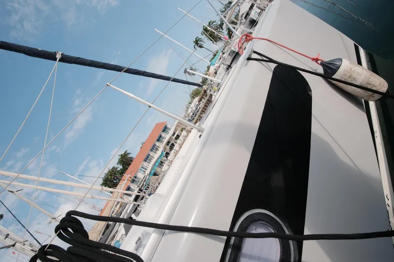 Slide: The Image of Leopard 46 yacht docked, showcasing sleek design and marina setting, 2007 model. - 8