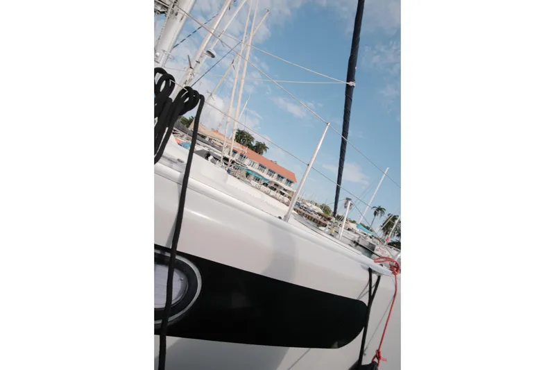 Slide: The Image of Sailboat deck view, Leopard 46 model, 2007, docked under clear blue sky. - 9