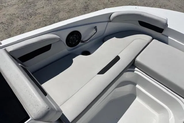 Slide: The Image of 2023 Hurricane SunDeck Sport 185 OB boat interior with cushioned seating and speaker. - 12