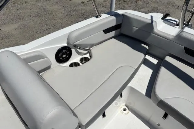 Slide: The Image of 2023 Hurricane SunDeck Sport 185 OB boat interior with cushioned seating and cup holders. - 15