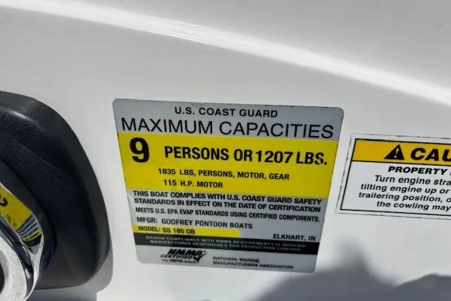 Slide: The Image of U.S. Coast Guard capacity label on 2023 Hurricane SunDeck Sport 185 OB boat. - 18
