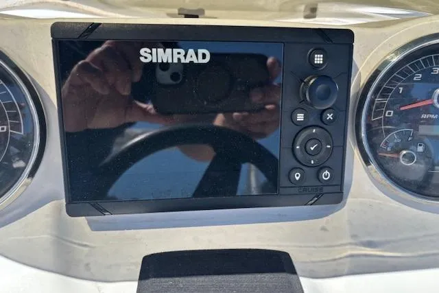 Slide: The Image of Simrad display on 2023 Hurricane SunDeck Sport 185 OB dashboard with gauges. - 20