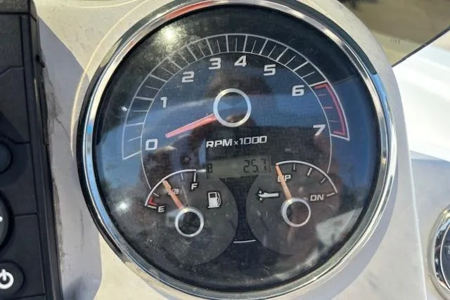 Slide: The Image of Tachometer and fuel gauge of 2023 Hurricane SunDeck Sport 185 OB boat. - 21