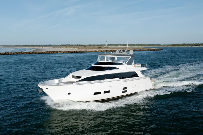 The Image of 2017 Hatteras M75 Panacera yacht cruising on open water. - 0