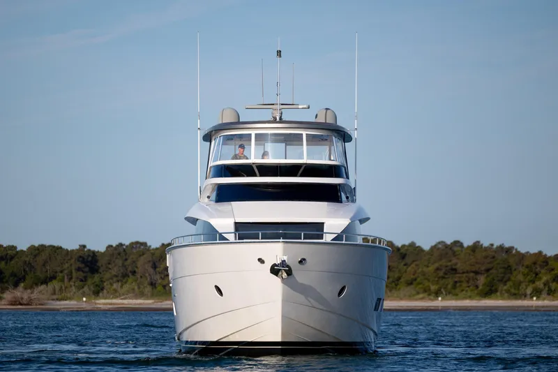 Slide: The Image of Front view of 2017 Hatteras M75 Panacera yacht on water. - 14