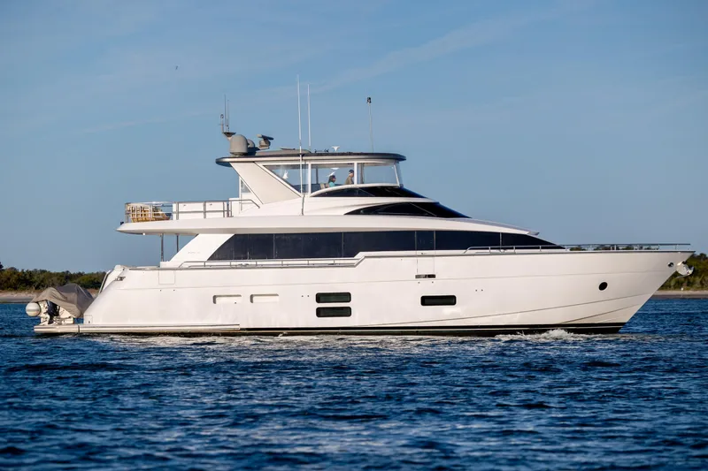 Slide: The Image of 2017 Hatteras M75 Panacera yacht cruising on open water. - 16