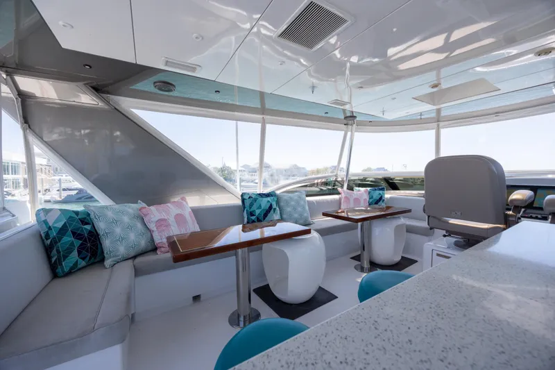 Slide: The Image of Luxurious interior of 2017 Hatteras M75 Panacera yacht with modern seating and decor. - 24