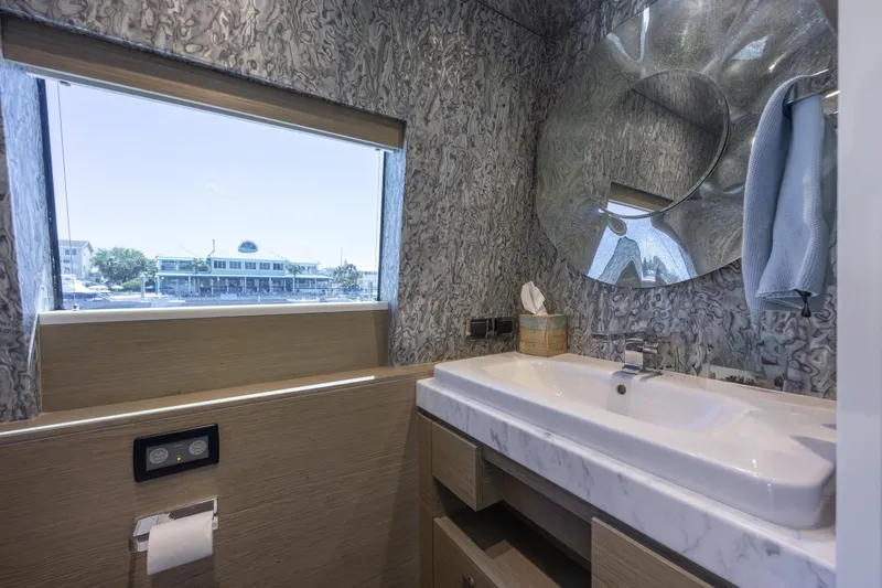 Slide: The Image of Luxurious bathroom interior of 2017 Hatteras M75 Panacera yacht with modern design elements. - 37