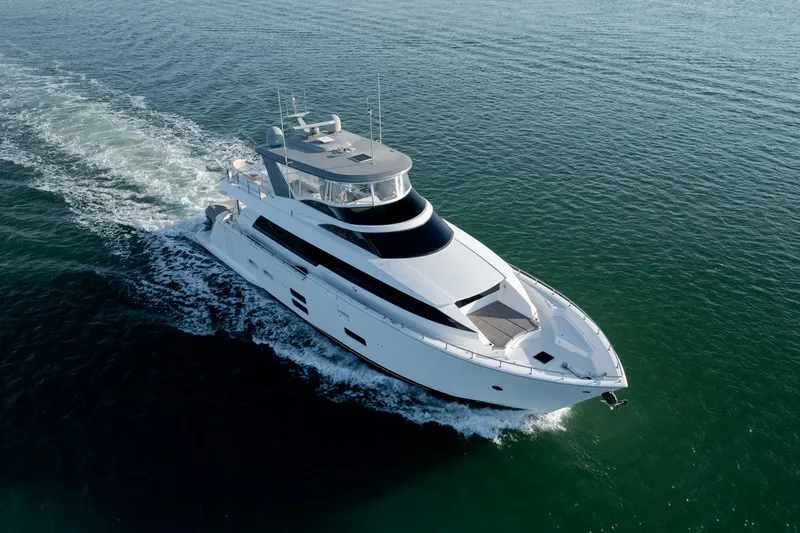 Slide: The Image of Luxurious 2017 Hatteras M75 Panacera yacht cruising on open water. - 4