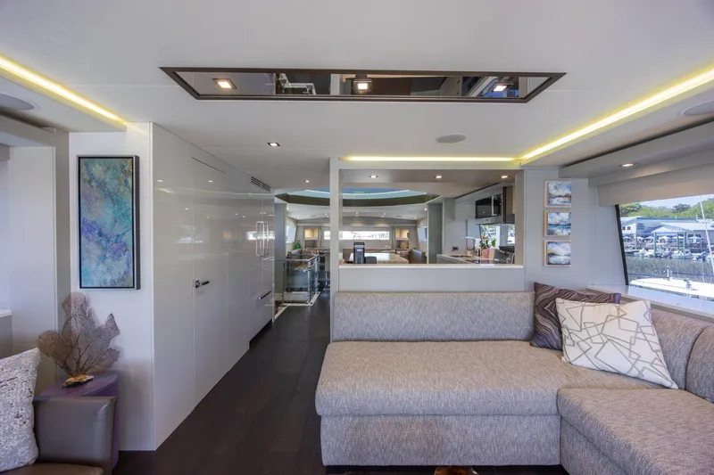 Slide: The Image of Luxurious interior of 2017 Hatteras M75 Panacera yacht with modern decor and spacious seating. - 44