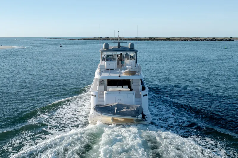 Slide: The Image of 2017 Hatteras M75 Panacera yacht cruising on open water. - 5
