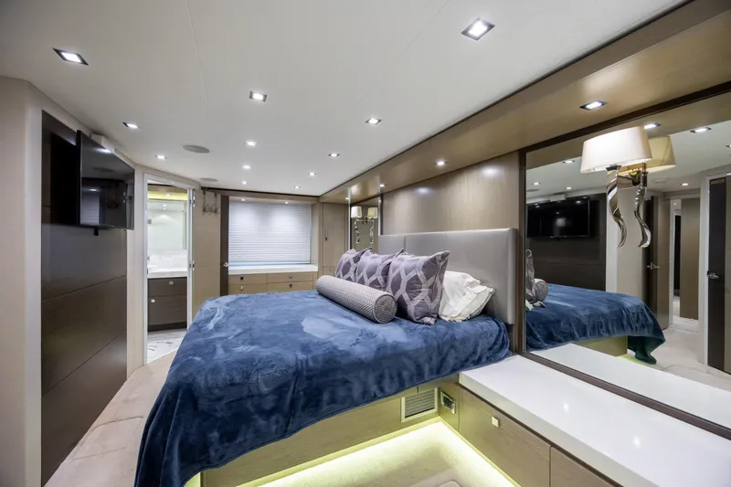Slide: The Image of Luxurious bedroom interior of 2017 Hatteras M75 Panacera yacht with modern decor and ambient lighting. - 59