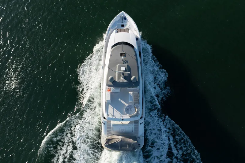 Slide: The Image of Aerial view of 2017 Hatteras M75 Panacera yacht cruising on open water. - 7
