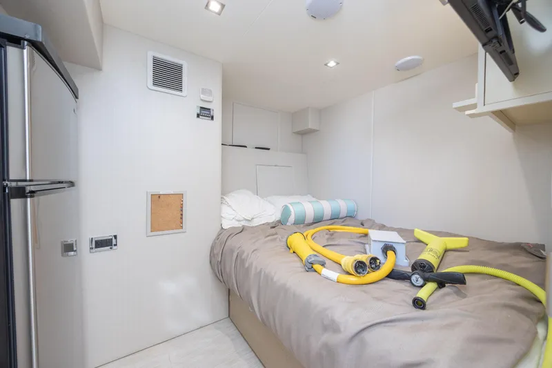 Slide: The Image of Interior cabin of 2017 Hatteras M75 Panacera yacht with bed and equipment. - 86