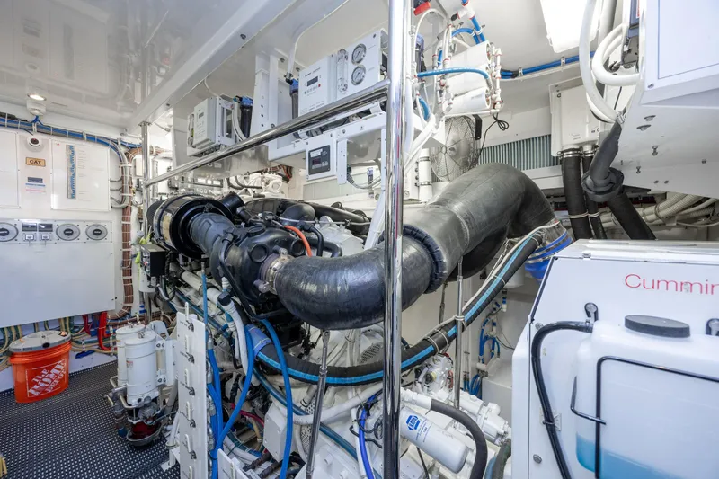 Slide: The Image of Engine room of 2017 Hatteras M75 Panacera yacht, featuring advanced machinery and equipment. - 91