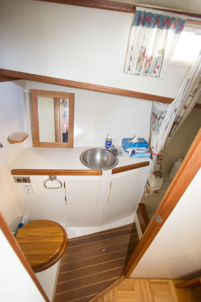 Slide: The Image of Compact bathroom on 1984 Californian LRC boat. - 17