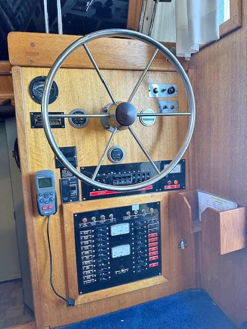 Slide: The Image of 1984 Californian LRC boat helm with wooden paneling. - 18