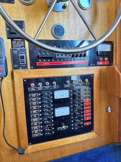 Slide: The Image of 1984 Californian LRC boat control panel with instruments. - 19