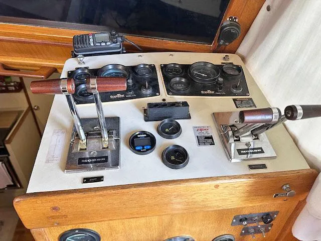 Slide: The Image of 1984 Californian LRC boat control panel with instruments. - 20