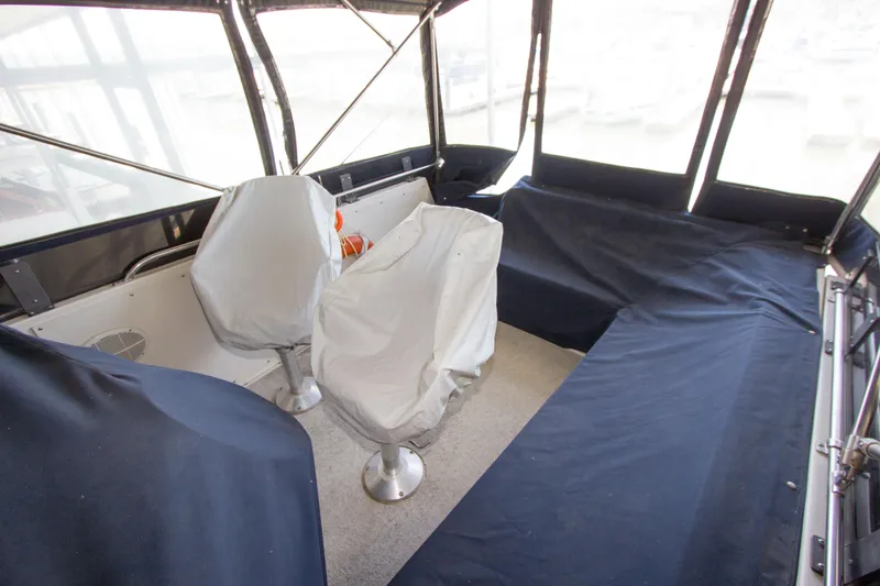 Slide: The Image of Interior of a 1984 Californian LRC yacht with seating area. - 24