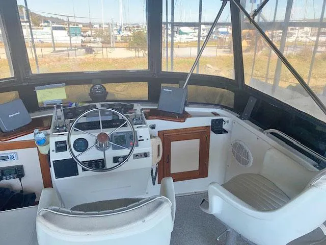 Slide: The Image of 1984 Californian LRC yacht helm with modern equipment. - 25