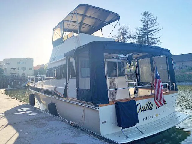 Slide: The Image of 1984 Californian LRC yacht docked with sunshade. - 4